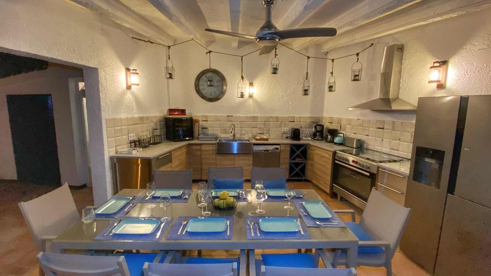 The outdoor kitchen, set for dinner
