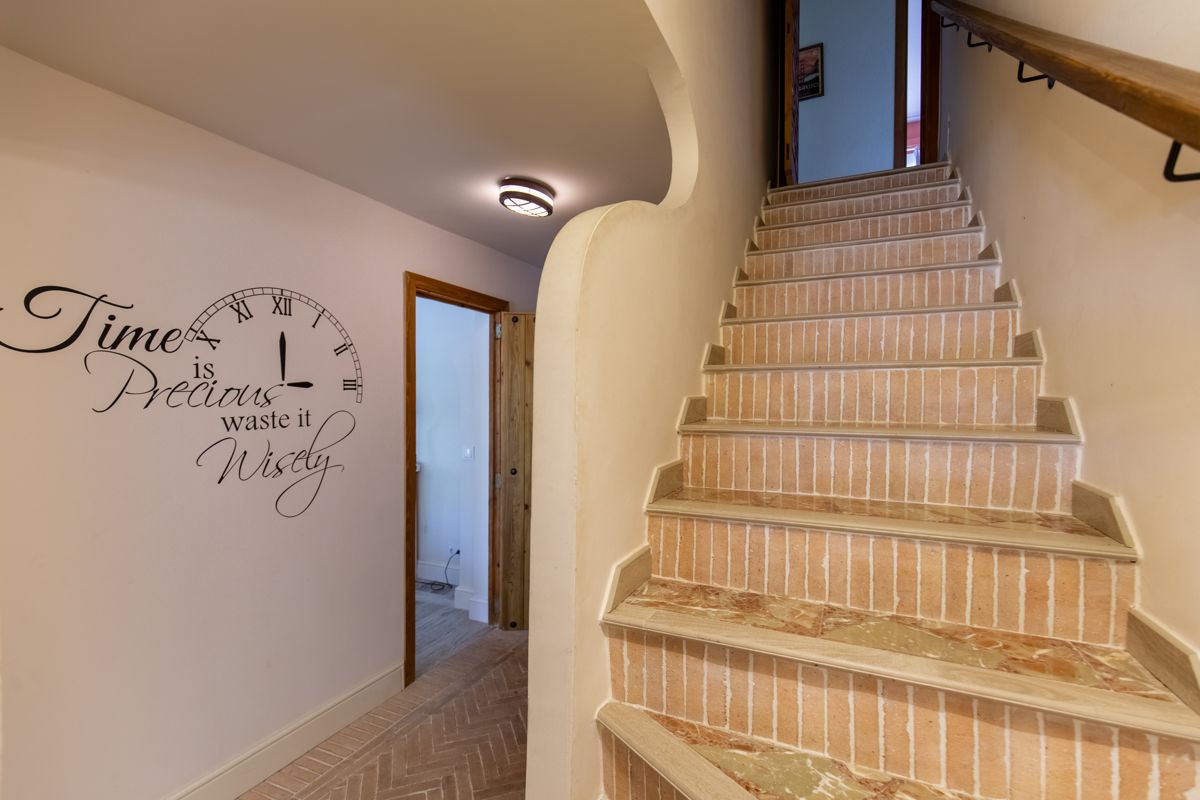 Staircase with tiled steps — Nauticaa, wing one of Villa Palmview, Jávea