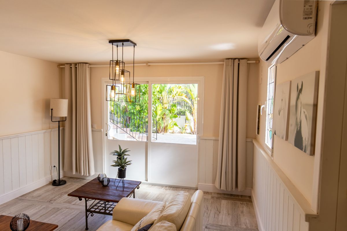 Seating area by the window — 20,000 Leagues Under the Sea, wing two of Villa Palmview, Jávea