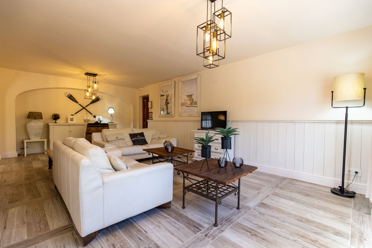 Living room with a desk — 20,000 Leagues Under the Sea, wing two of Villa Palmview, Jávea