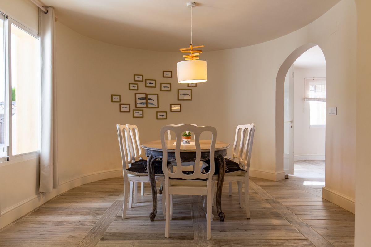 Dining corner with a round table — 20,000 Leagues Under the Sea, wing two of Villa Palmview, Jávea